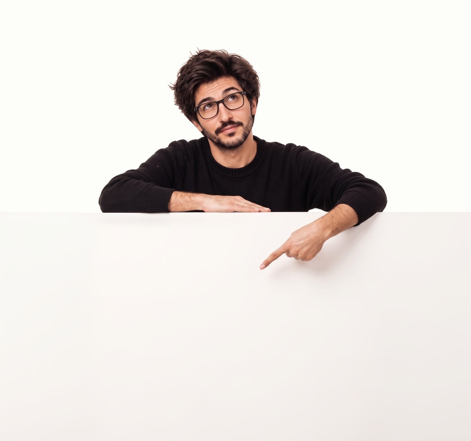 Abdola Munir leaning on a board and pointing at the headline
